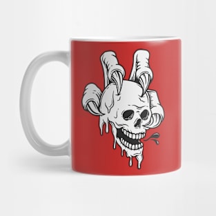 Skull in monster hand Mug